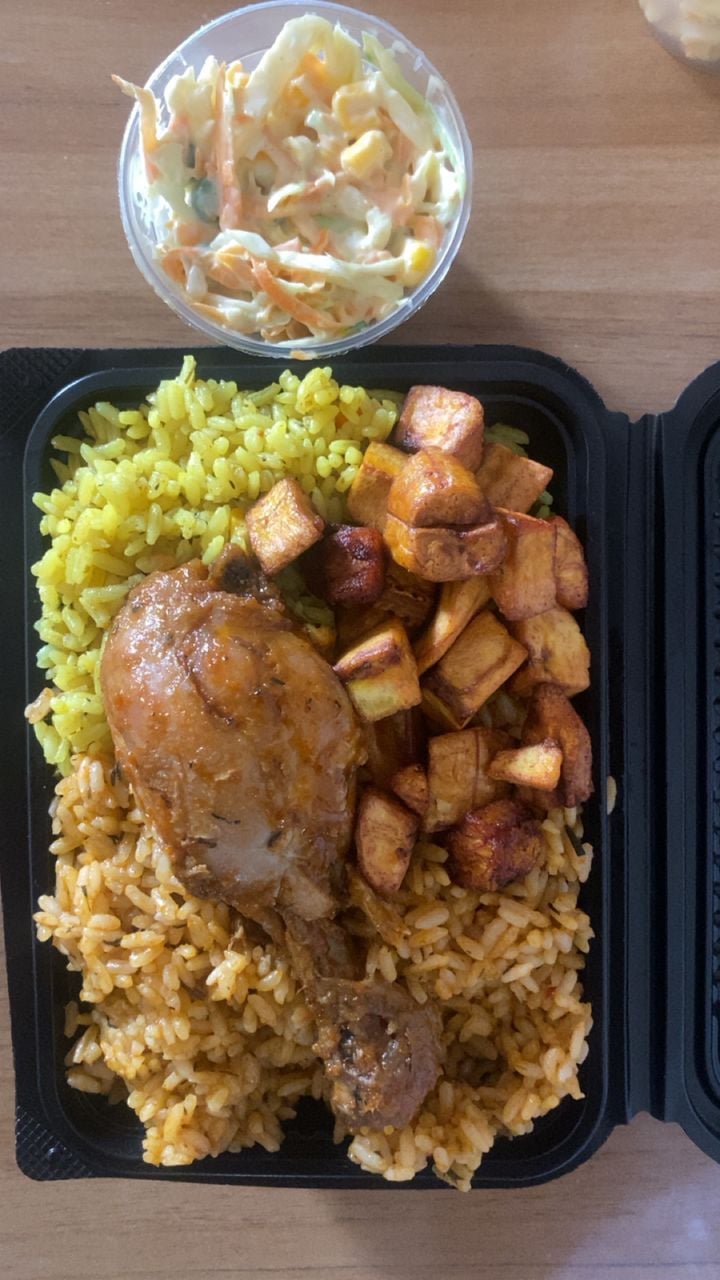 Jollof and fried rice with drumsticks 